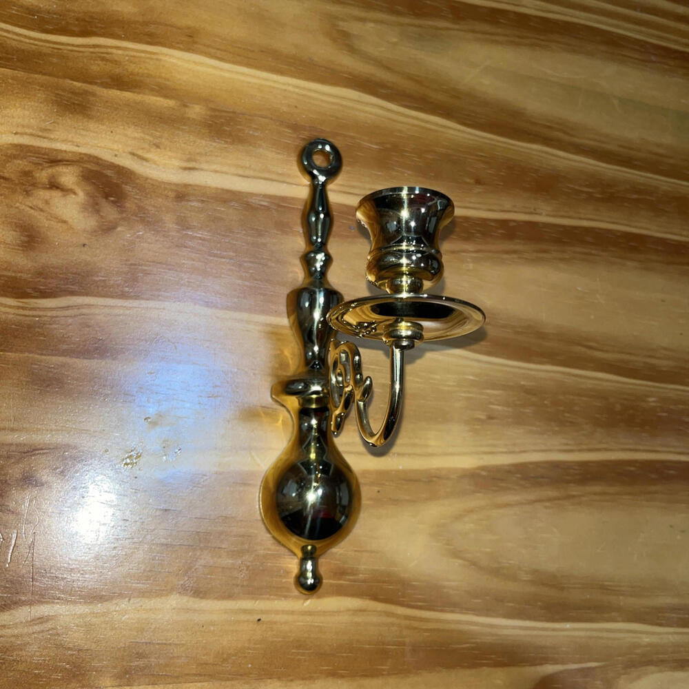 Brass wall candlestick holder
